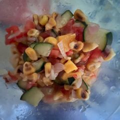 A picture of Mango Salsa with sweet corn.
