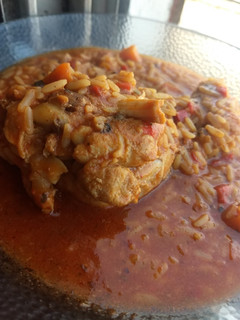 Una foto de Guiso de arroz con pollo