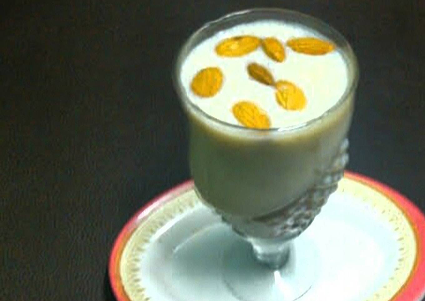Banana shake with ice cream and dry fruits