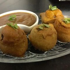 A picture of Batata Vada Aka Aloo Bondey/ Aloo kachori.