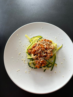 Una foto de 🌱 Spaghetti di zucchini con beans y anacardos 🌱