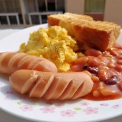 A picture of Sausage And Scrambled Eggs Breakfast.