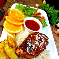 Bbq chicken steak with spaghetti and wedges A picture of Bbq chicken steak with spaghetti and wedges.