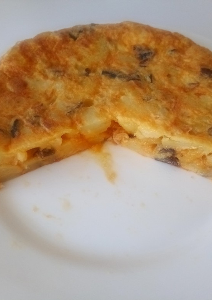 Una foto de Tortilla de patatas y setas
