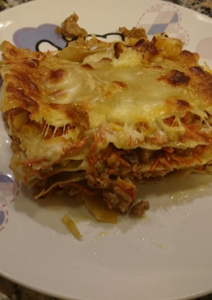 Una foto de Lasaña bolognesa