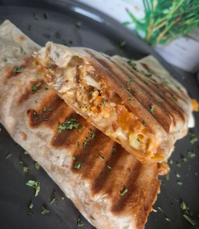 Une photo de Tacos aux tenders sauce fromagère