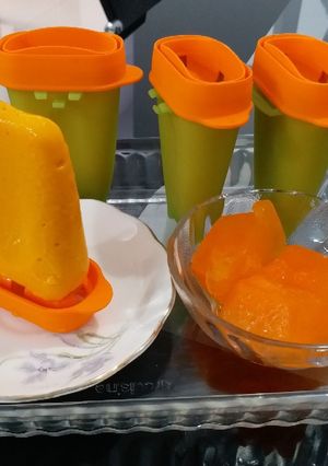A picture of Mango Popsicles and Lemon cum Orange Flavoured Glucon-The Cubes.