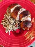 Duck Breast with cranberry walnut quinoa and balsamic reduction
