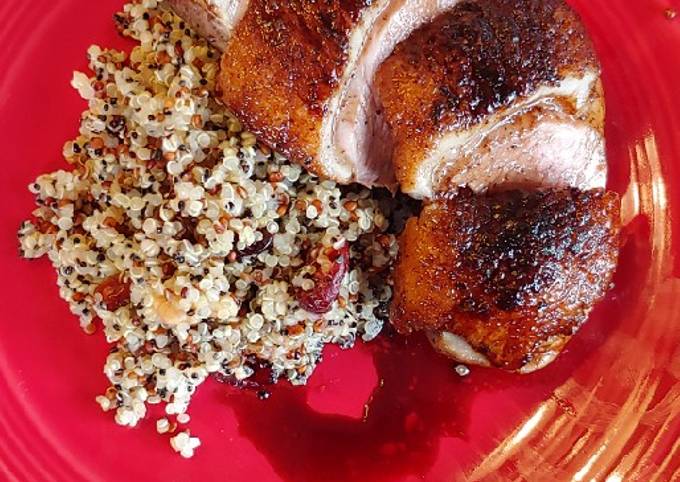 Duck Breast with cranberry walnut quinoa and balsamic reduction