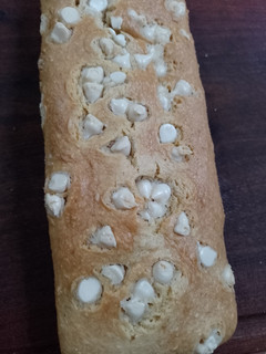 Una foto de Budín de coco y chocolate blanco (sin gluten) 💚😋