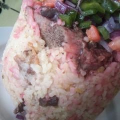 A picture of Chinese spicy beef rice with kachumbari.