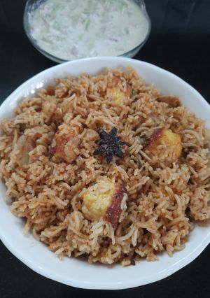 A picture of Tomato Paneer Biryani.