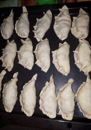 Una foto de Empanadas de pollo y de carne