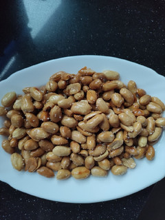 Una foto de Cacahuetes fritos con miel y sal