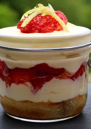 A picture of Tiramisu with Limoncello Cream and Strawberries 🍓🍋.