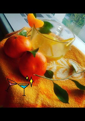 A picture of Orange turmeric and ginger immunity booster detox drink.