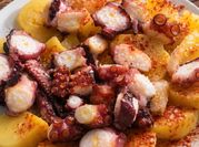 Una foto de patas de pulpo cocido