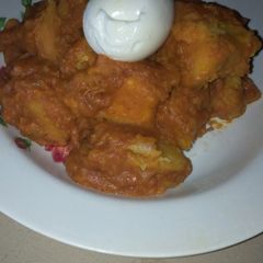 A picture of Porridge and egg.
