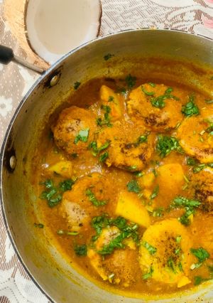 A picture of Nadia Bara Tarkari (Coconut dumplings curry).