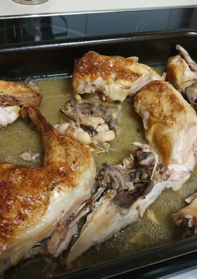 Una foto de Pollo asado con cerveza, zumo de limón y zumo de mandarina