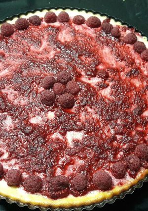 Una foto de Cheesecake de frambuesas tamaño pie