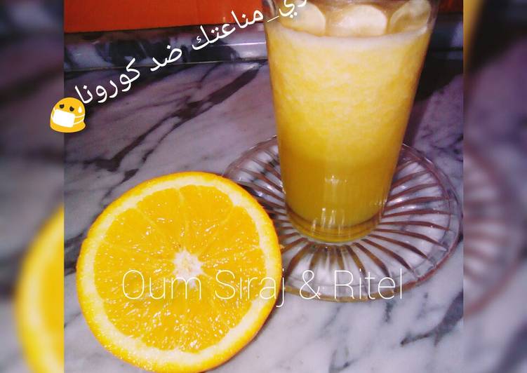 عصير طبيعي بالبرتقال والزنجبيل