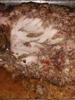 Una foto de Pernil al horno o leña