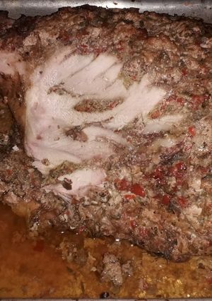 Una foto de Pernil al horno o leña