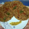 Spicy onion and tomato paratha