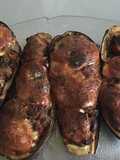 Aubergines farcies saucisses Strasbourg champignons poivrons épices cajun et scamorza grillée