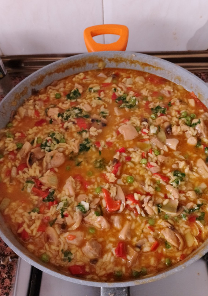 Una foto de Arroz meloso de pollo