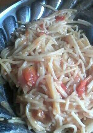 A picture of Tomatoes spaghetti.
