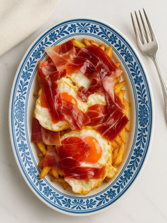 Una foto de Huevos Rotos con Jamón 🍳