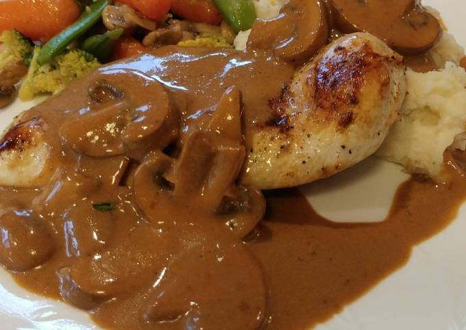 Pan Seared Chicken Breast smothered in a Crimini Mushroom Sauce