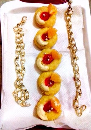 A picture of Orange (cashew) kaju sandesh.