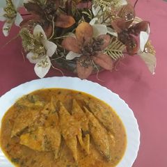 A picture of Fish simply masala with gravy.