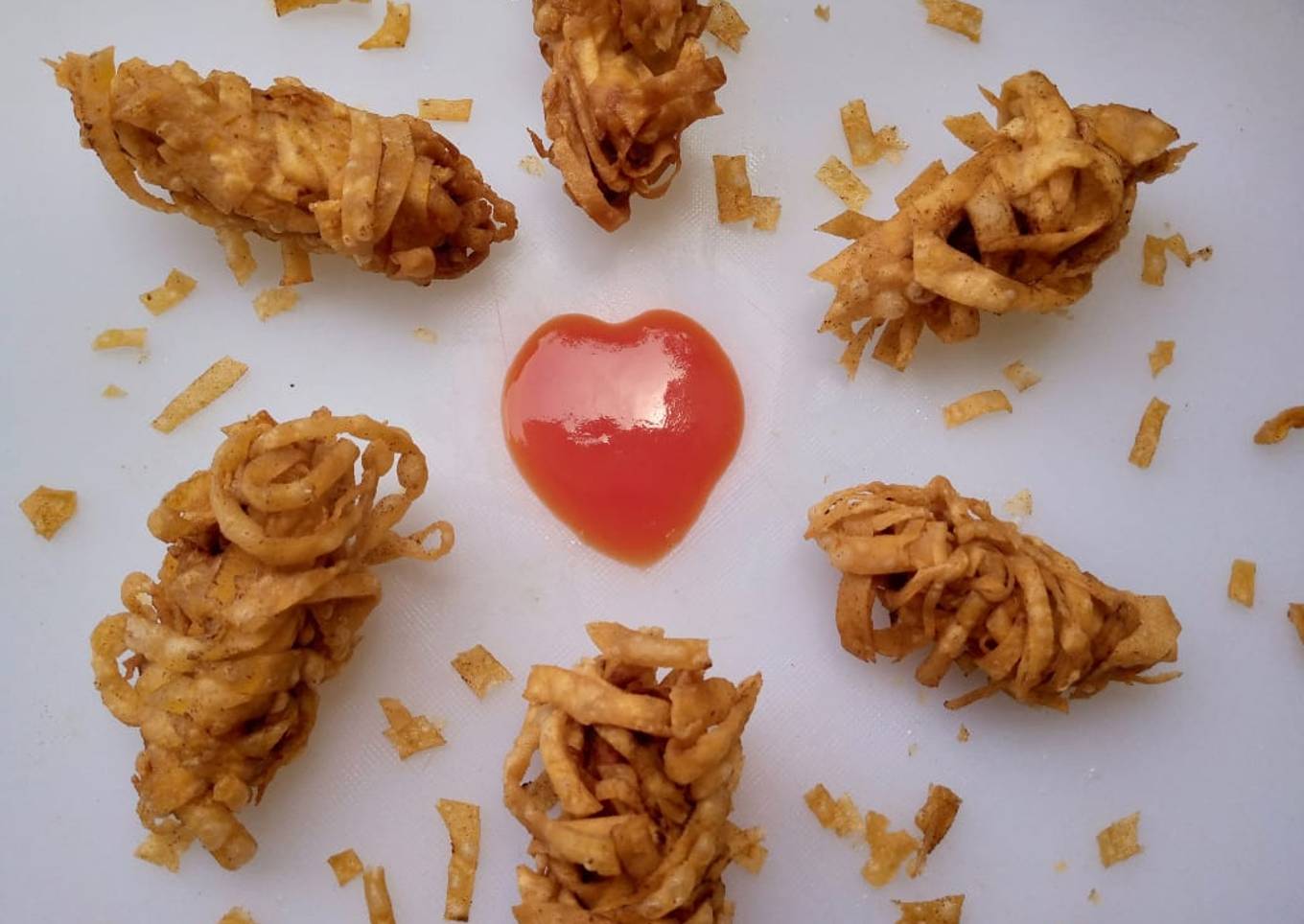 Thread wrapped chicken strips