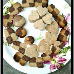 A picture of Homemade atta cookies/biscuits baked in kadai.