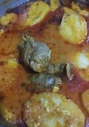 Una foto de Niño envuelto de carne con jamón y queso