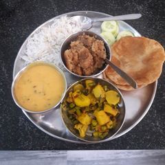 A picture of Vegetables besan kadhi.