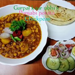 Punjabi potato chickpeas 🥔🍅🌿🧅🧄 A picture of Punjabi potato chickpeas 🥔🍅🌿🧅🧄.