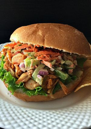 A picture of Jackfruit Burgers with Zucchini-Carrot Slaw.