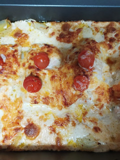 Una foto de Salmón al horno gratinado con verduras