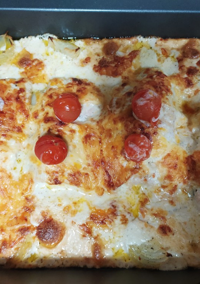 Una foto de Salmón al horno gratinado con verduras