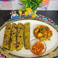 Avocado thepla with with aloo ki sukhi sabji A picture of Avocado thepla with with aloo ki sukhi sabji.