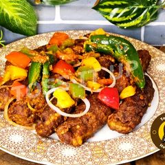A picture of Soft Creamy And Juicy Chicken Chutney Seenkh Kabaab.
