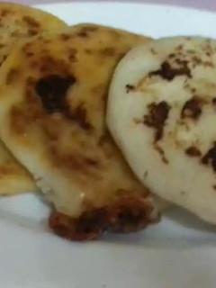 Una foto de Pupusas bacon
