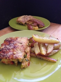Una foto de Guiso de zapallo italiano y queso rallado con papas rústicas