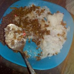 A picture of Lentils with boiled rice.