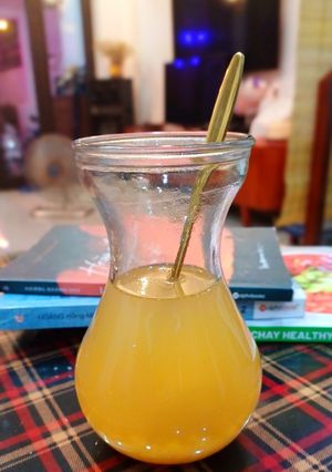 Hình của món Trà gừng, mật ong và mứt vỏ bưởi.